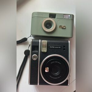 2 cameras. Instax mini and instant camera